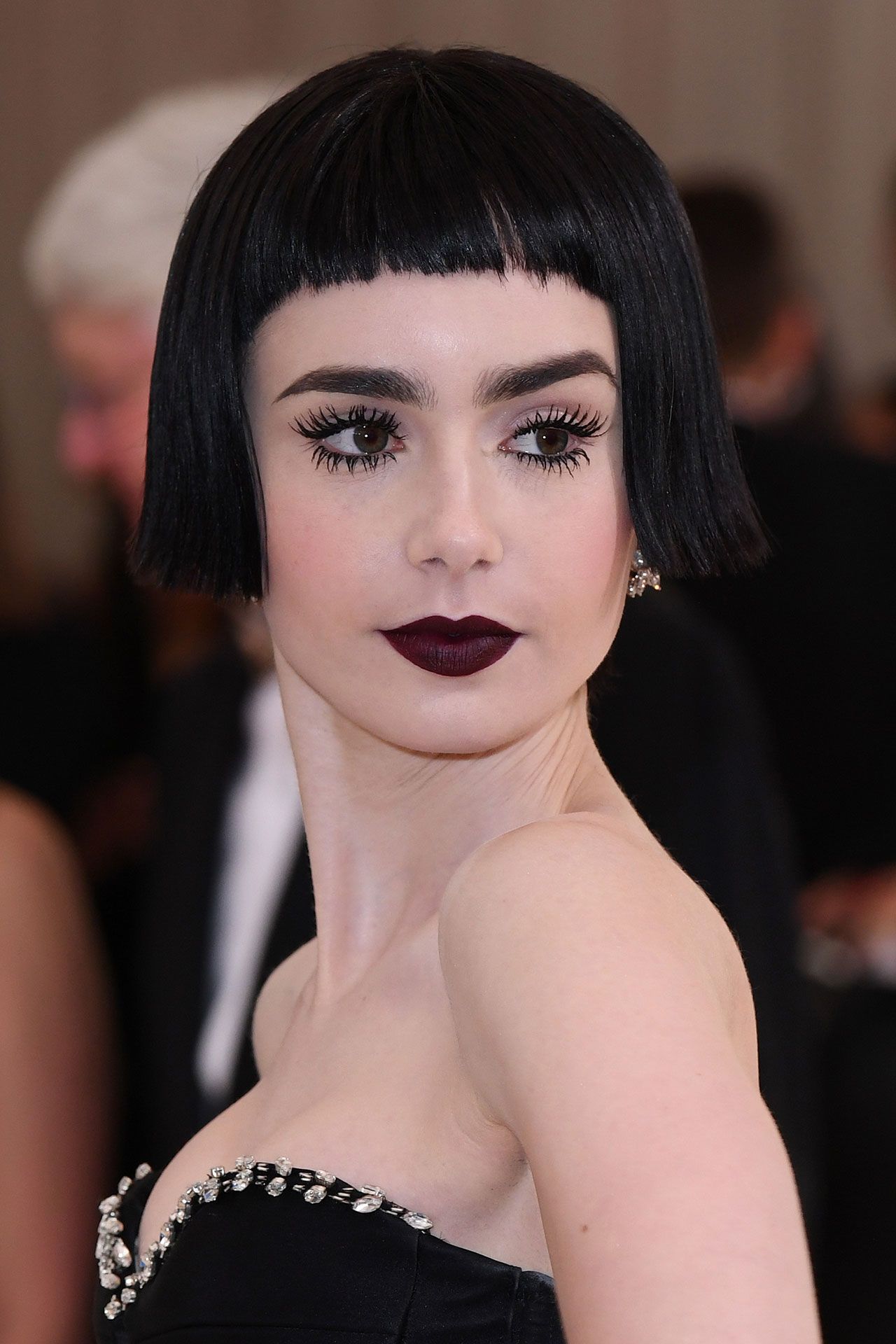 Lily Collins met pony