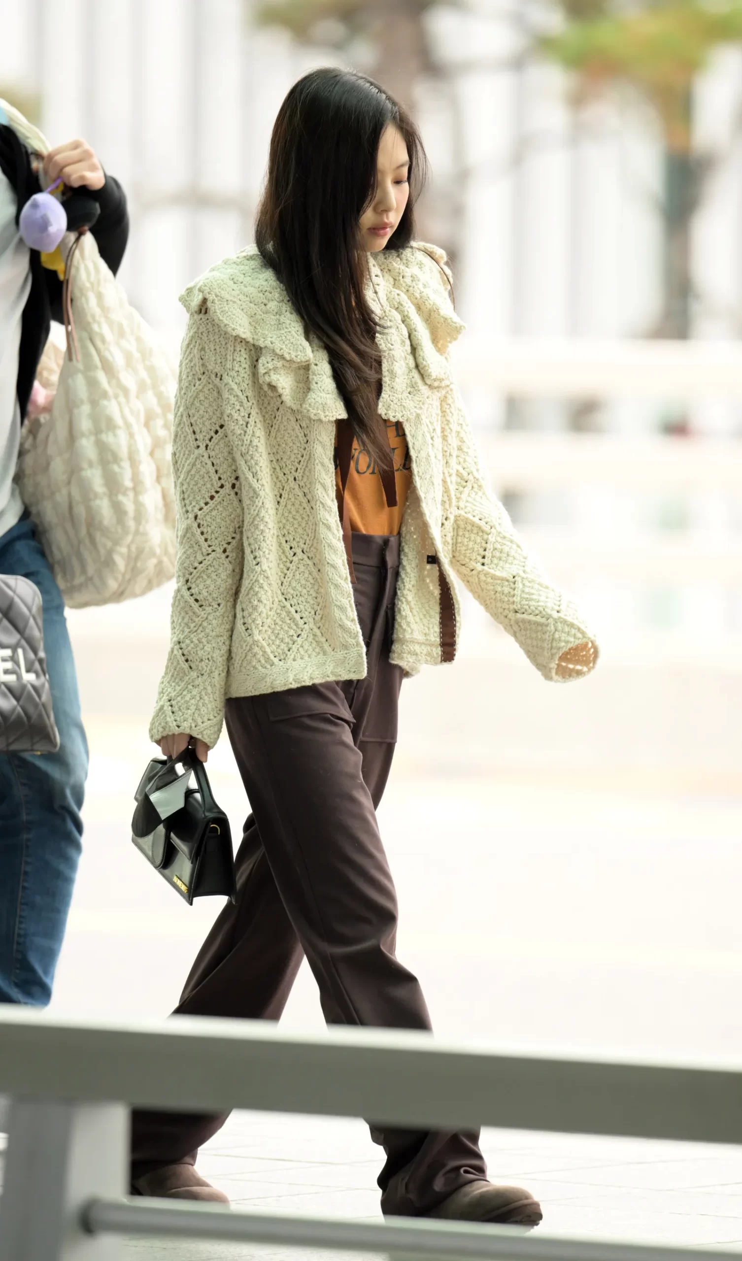 Jennie op het vliegveld