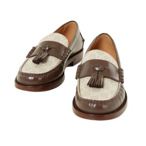 bruin/beige loafers van gucci