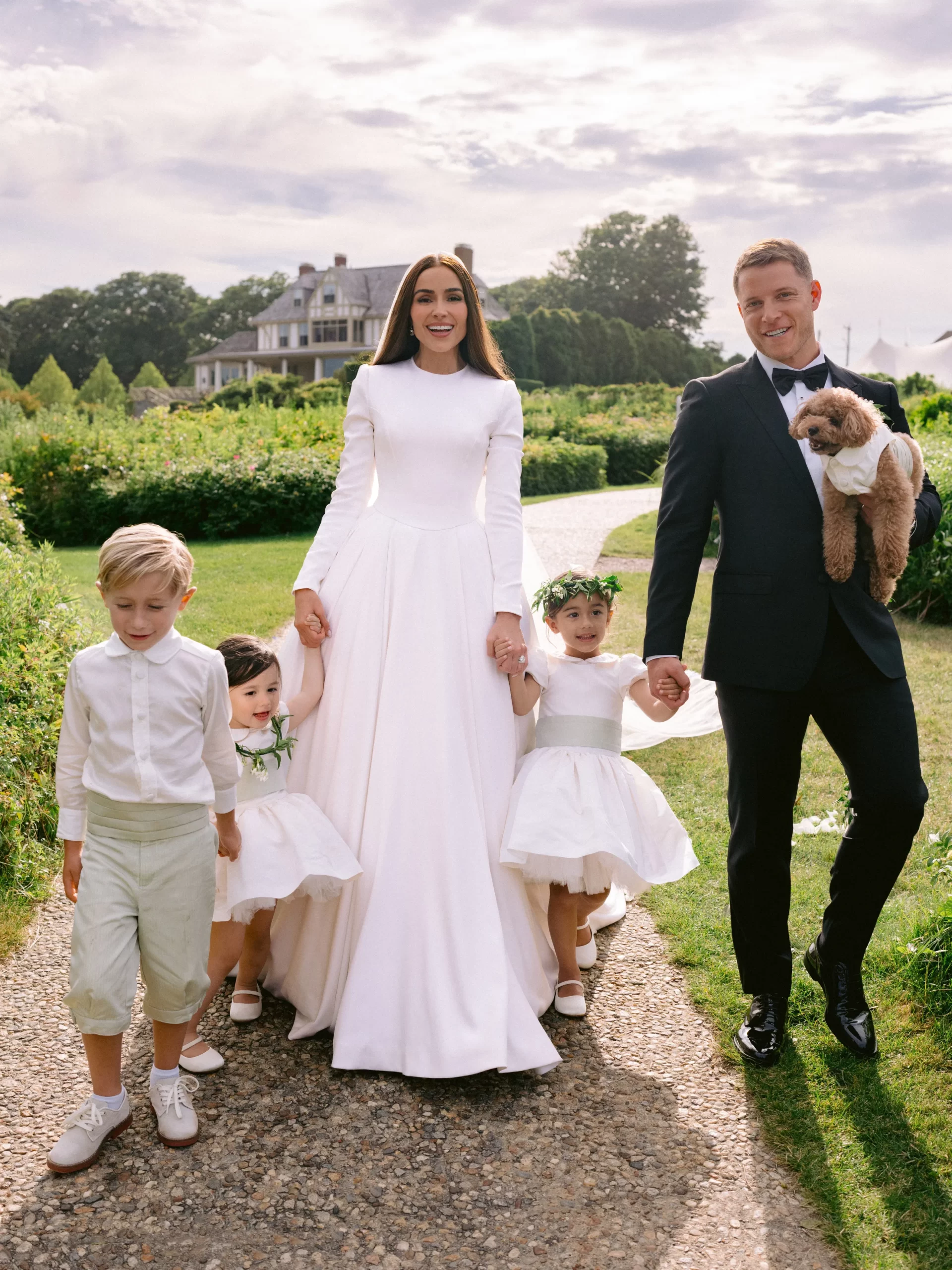 Olivia Culpo en Christian McCaffrey op hun bruiloft