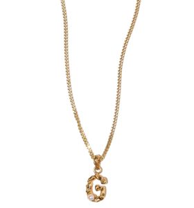 Gouden schakelketting met letter van Les Mères