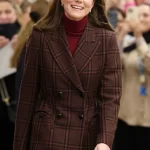 Kate Middleton met een van haar Smythson tassen