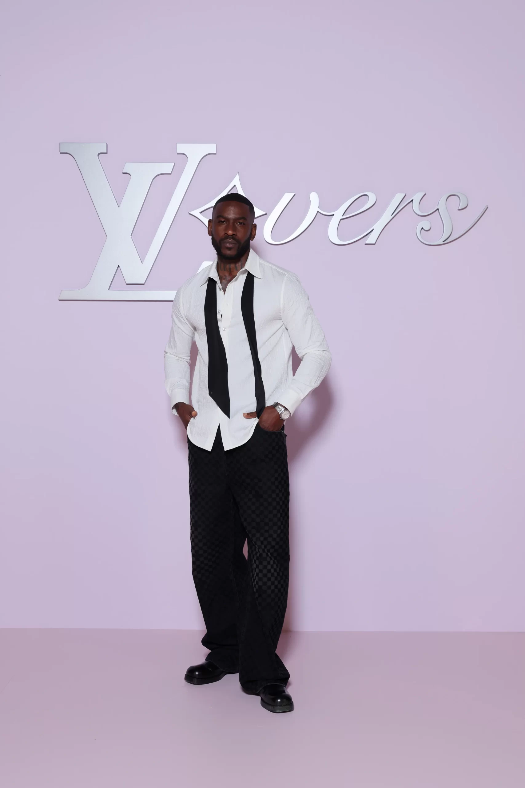 Skepta bij de herfst/winter 2025-mannenmodeshow van Louis Vuitton