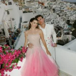 De bruiloft van Madeleine White en Andrew Fedyk op Santorini