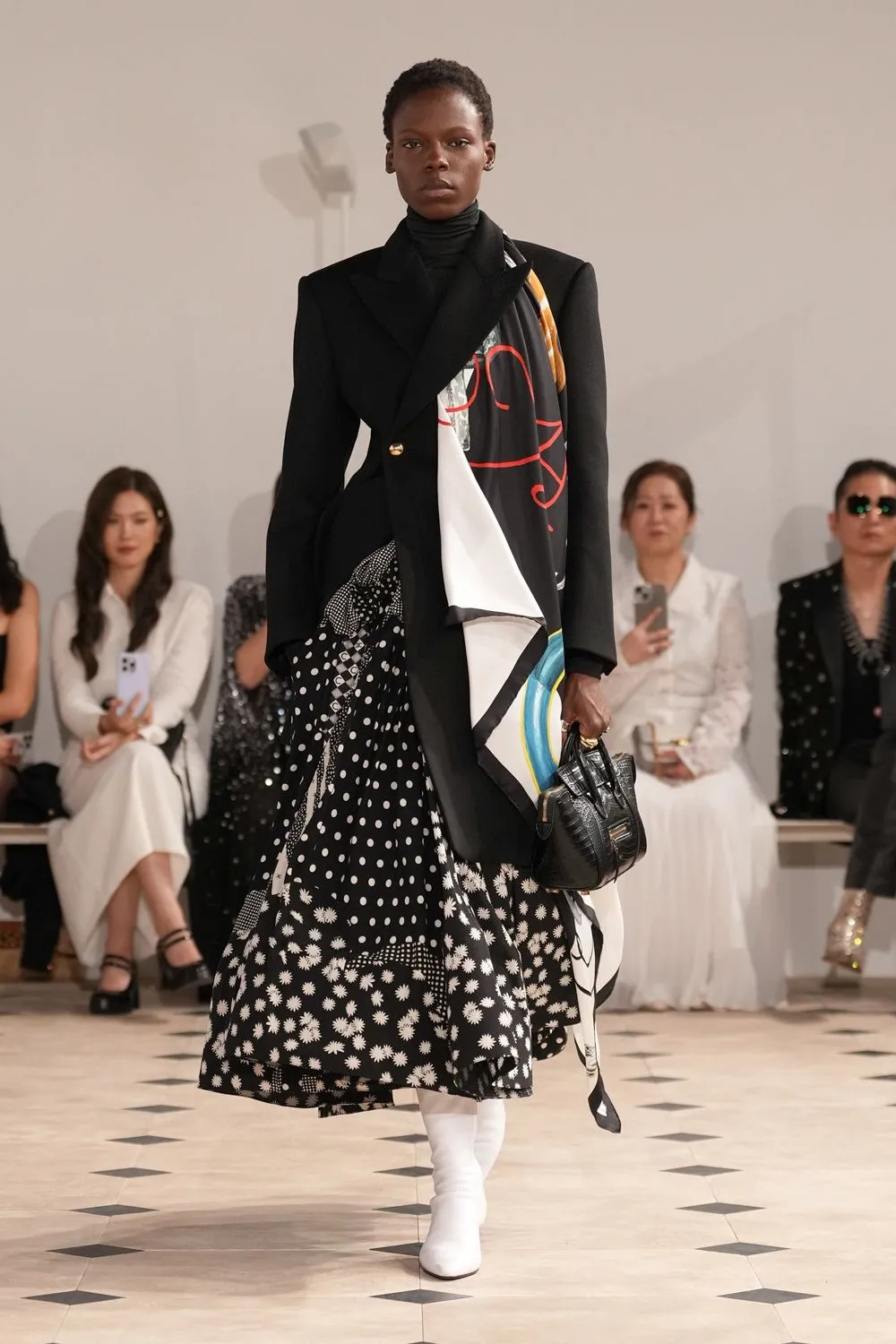 De New Luggage-tas van Celine op de runway.