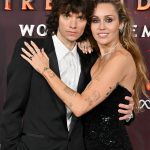 Miley Cyrus en Maxx Morando bij Avatar-première