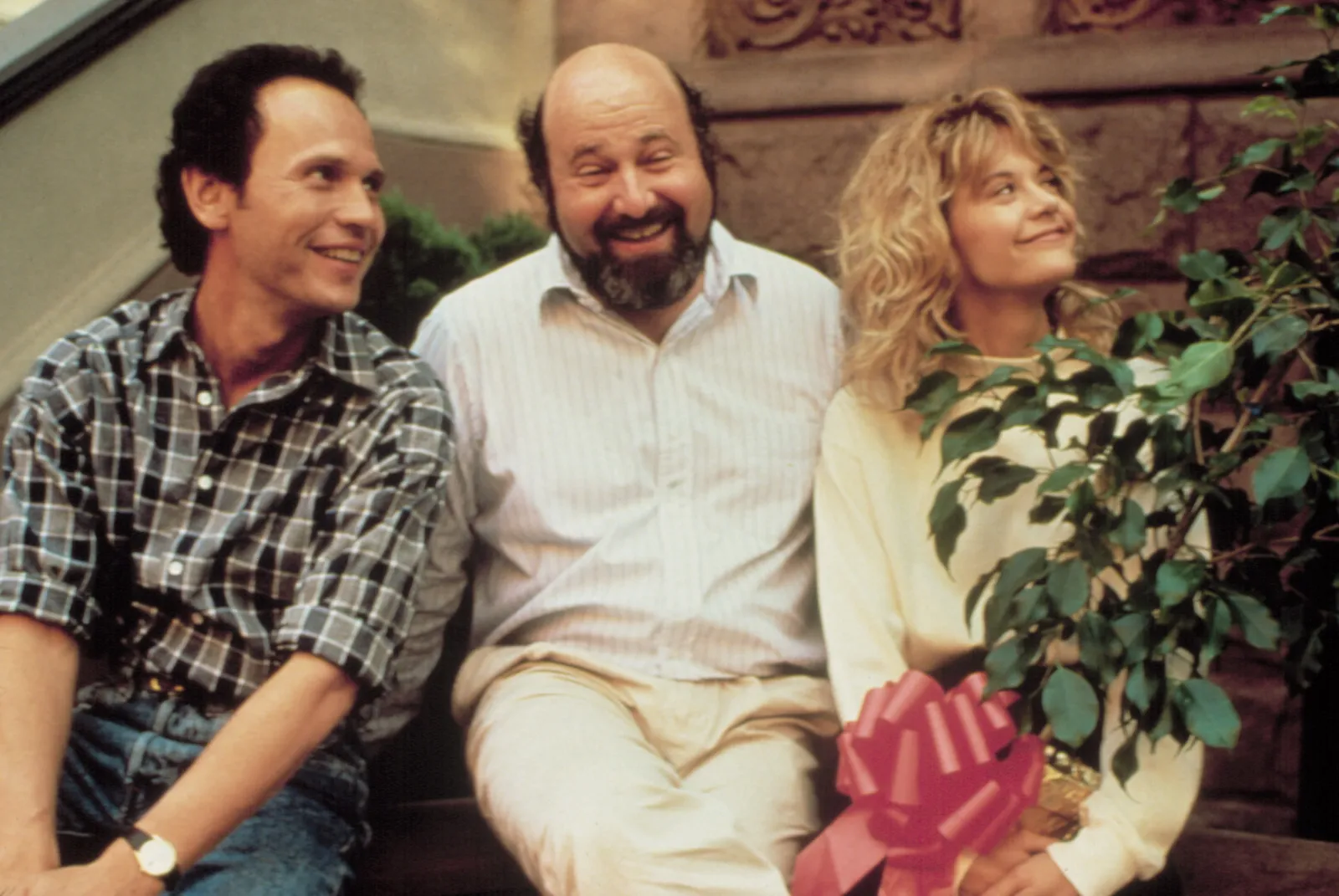 Reiner met Billy Crystal en Meg Ryan op de set van 'When Harry Met Sally…', circa 1989.