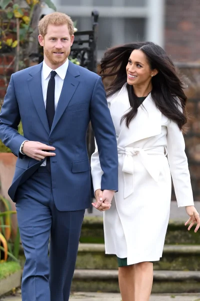 meghan-markle-geeft-de-2016-throwbacktrend-een-romantische-twist-380875