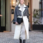 Charlize Theron in een jas van Desigual