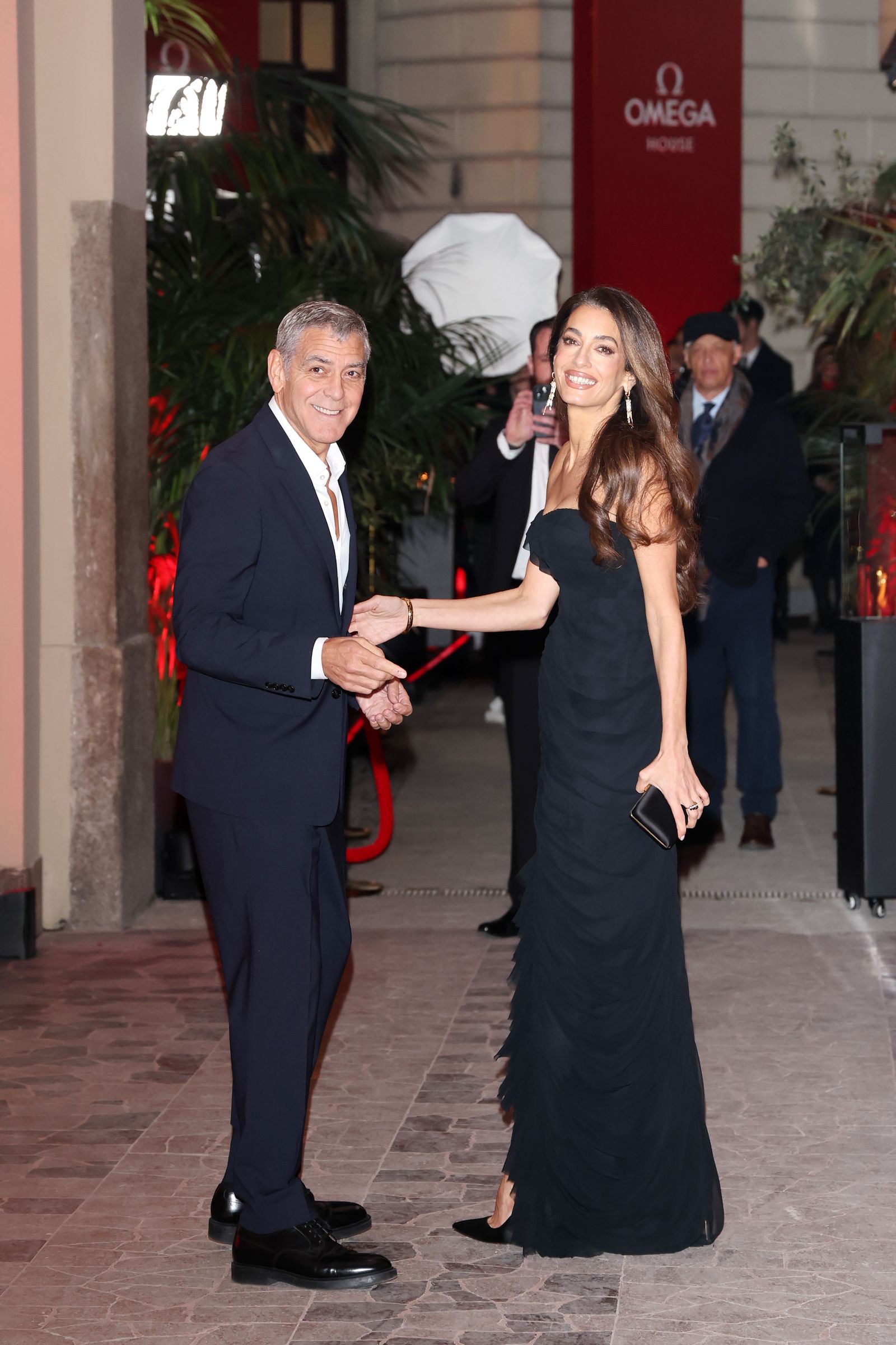 George en Amal Clooney bij Omega House Milaan Cortina voor de Winterspelen 2026