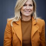 Koningin Máxima draagt een oranje pak van Claes Iversen