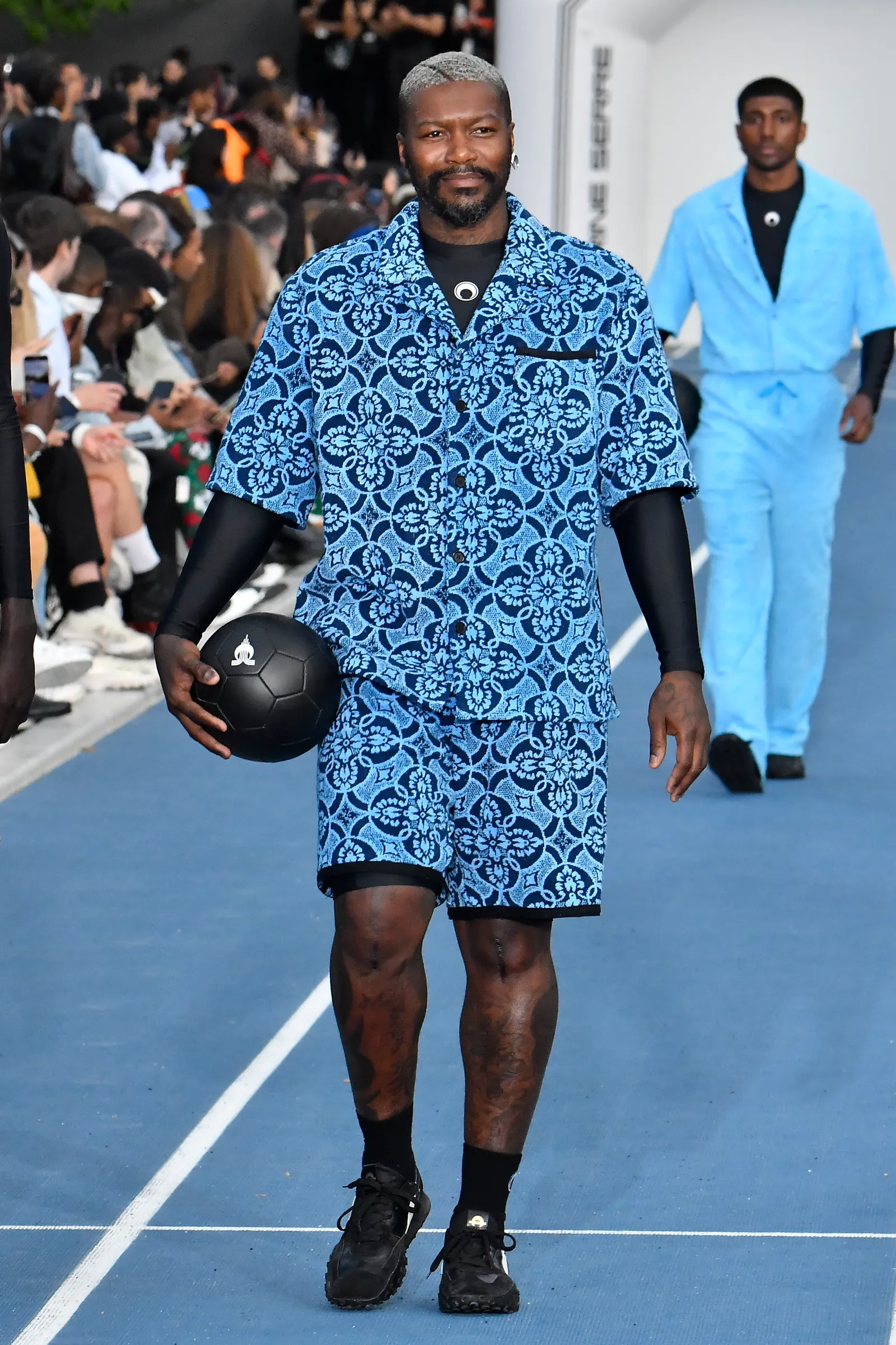 Voetbaler Djibril Cissé op de catwalk