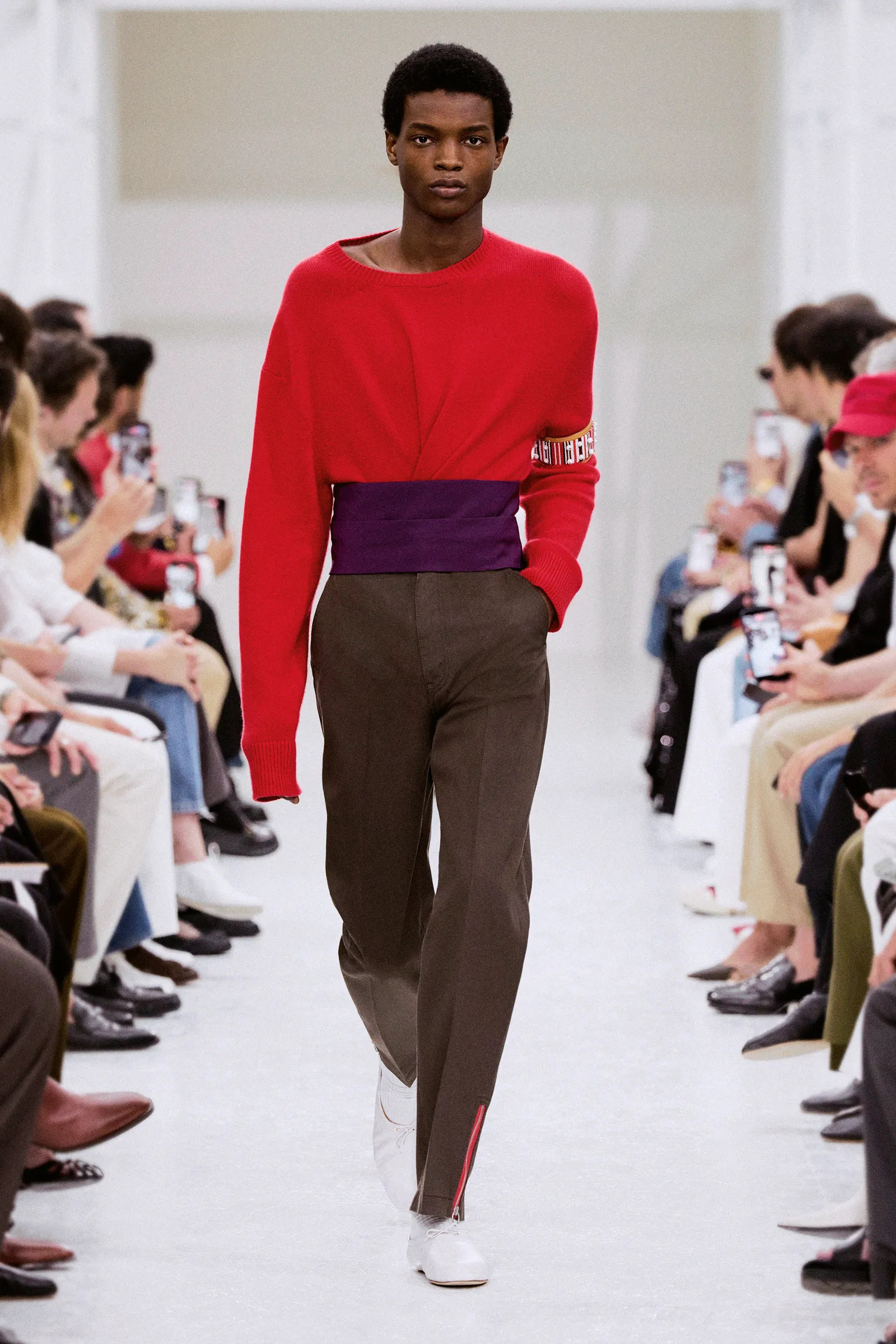 Een taille-sjaal bij mannen is een trend
