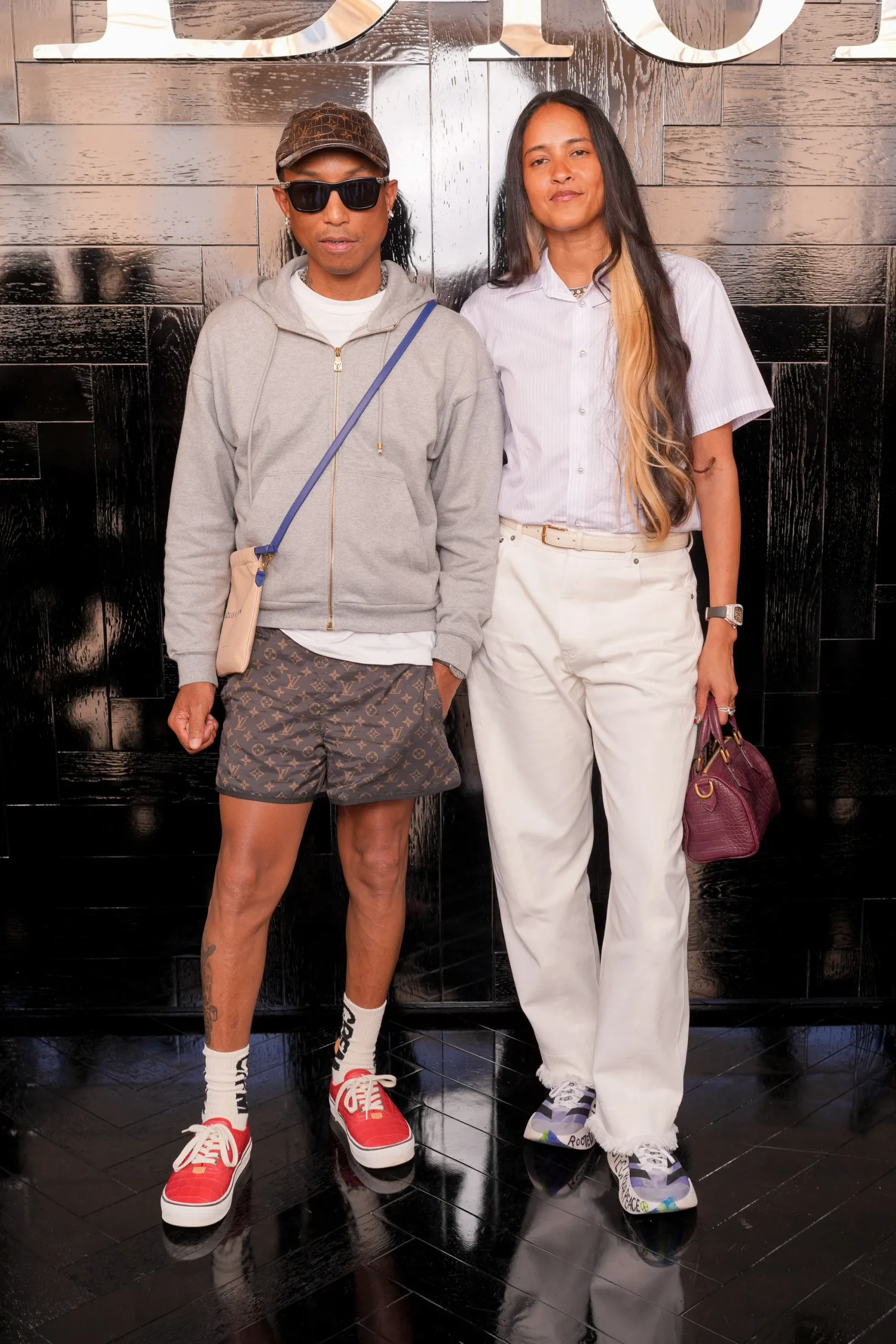 Pharrell Williams en Helen Lasichanh Williams bij de Dior couture herfst/winter 2026-show in Parijs